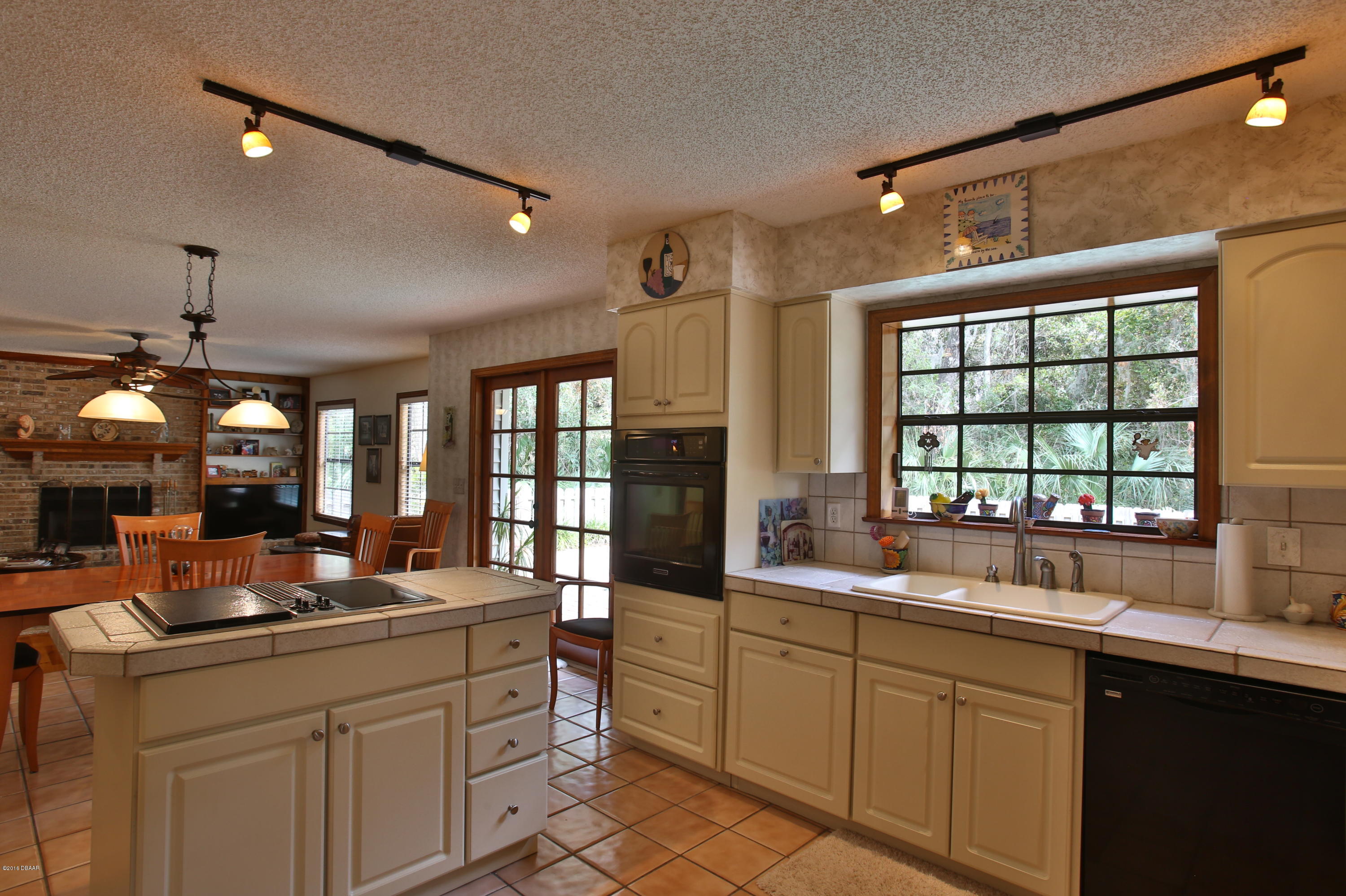 657 Needlerush Road Port Orange, FL 32127 - Photo 7 of 29 Updated, Open and Sunny Kitchen