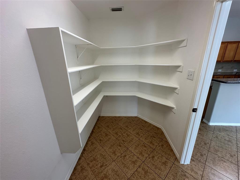 9321 Fenway Drive McKinney, TX 75072 - Photo 10 of 22 a view of a walk in closet