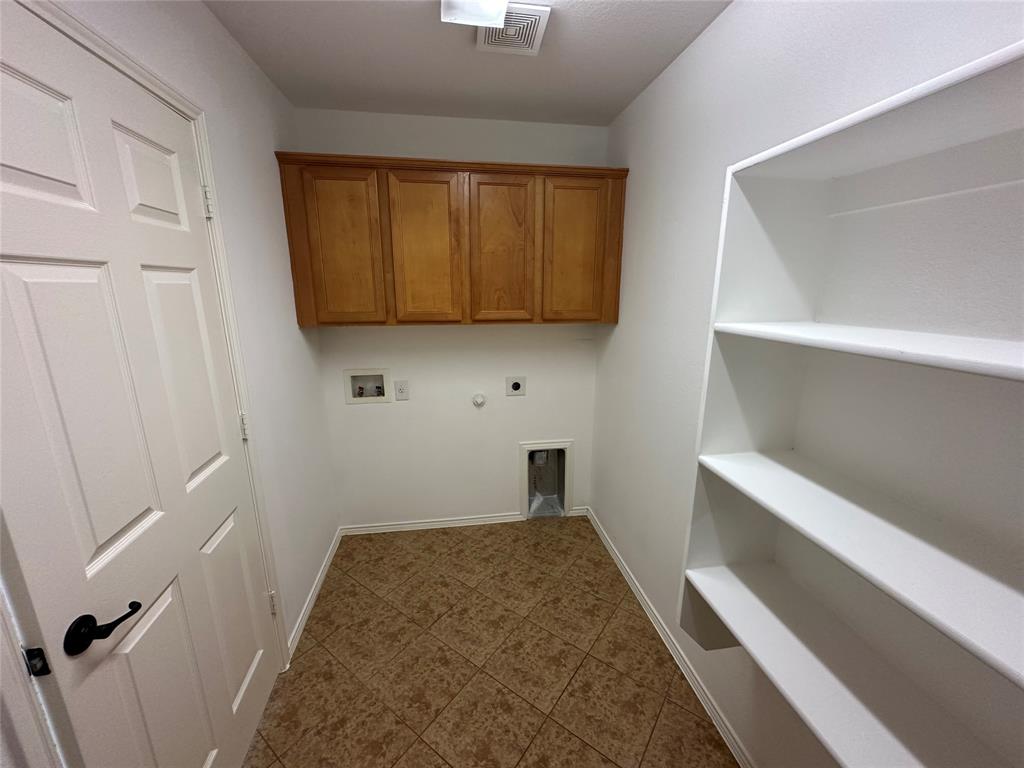 9321 Fenway Drive McKinney, TX 75072 - Photo 11 of 22 a bedroom with a bed and a window