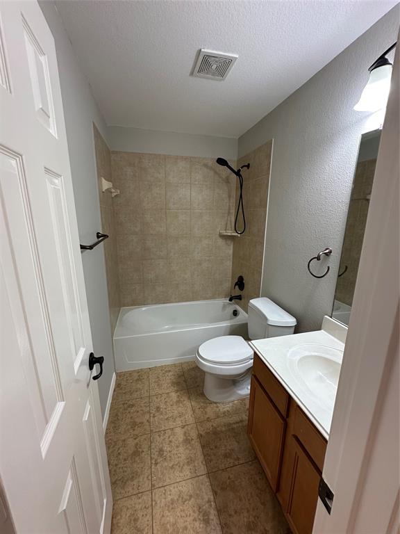9321 Fenway Drive McKinney, TX 75072 - Photo 14 of 22 a bathroom with a sink a toilet and shower