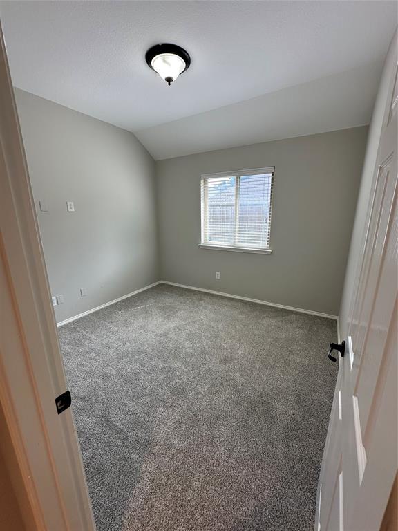 9321 Fenway Drive McKinney, TX 75072 - Photo 15 of 22 wooden floor in an empty room with a window