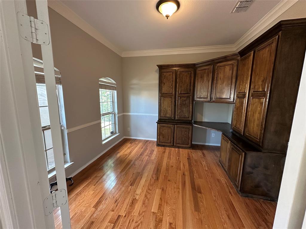 9321 Fenway Drive McKinney, TX 75072 - Photo 3 of 22 a view of a kitchen from a hallway