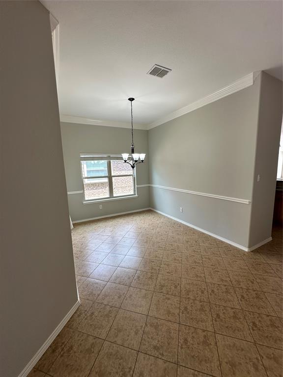 9321 Fenway Drive McKinney, TX 75072 - Photo 4 of 22 an empty room with windows and entrance