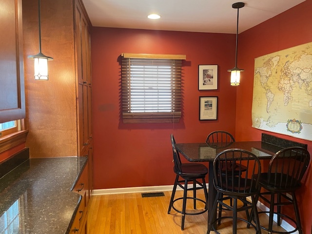 1505 West Acres Road Joliet, IL 60435 - Photo 16 of 42 a view of a dining room with furniture and chandelier