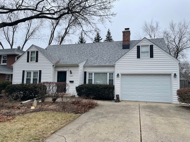 1505 West Acres Road Joliet, IL 60435 - Photo 2 of 42 a front view of a house with garden