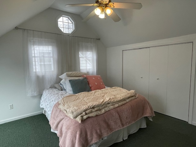 1505 West Acres Road Joliet, IL 60435 - Photo 25 of 42 a bedroom with a bed and a chandelier