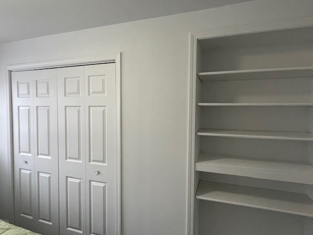1505 West Acres Road Joliet, IL 60435 - Photo 29 of 42 a view of walk in closet with empty racks