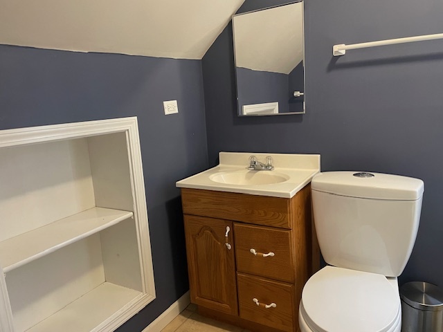 1505 West Acres Road Joliet, IL 60435 - Photo 31 of 42 a bathroom with a toilet and a sink