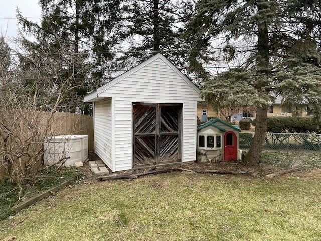 1505 West Acres Road Joliet, IL 60435 - Photo 42 of 42 a view of a small house with a yard