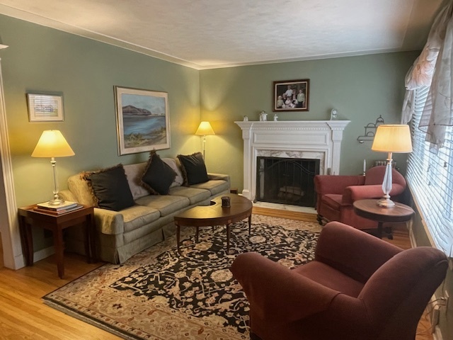 1505 West Acres Road Joliet, IL 60435 - Photo 5 of 42 a living room with furniture and a fireplace