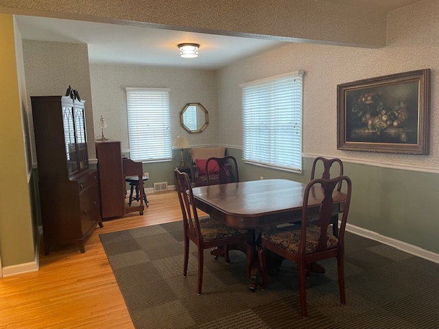 1505 West Acres Road Joliet, IL 60435 - Photo 8 of 42 a view of a dining room with furniture and window