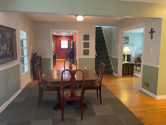 1505 West Acres Road Joliet, IL 60435 - Photo 10 of 42 a view of a dining room with furniture and wooden floor