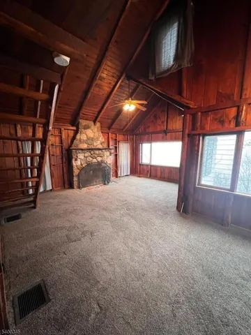 a view of large room with large windows