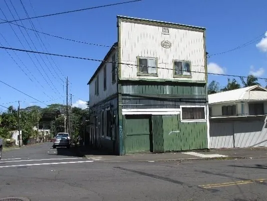 a front view of a house with a garage
