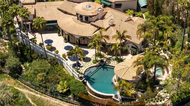 a kitchen with stainless steel appliances granite countertop a stove and a refrigerator