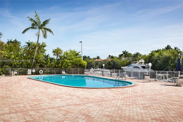 a swimming pool with plants