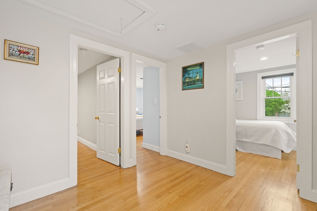 5 Brewster Road Arlington, MA 02478 - Photo 20 of 39 a view of livingroom with hardwood floor and hallway