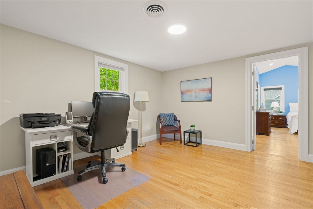 5 Brewster Road Arlington, MA 02478 - Photo 21 of 39 a view of a workspace with furniture and a window