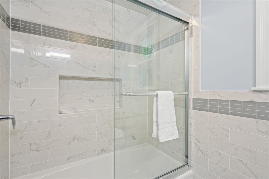 5 Brewster Road Arlington, MA 02478 - Photo 32 of 39 a bathroom with a shower