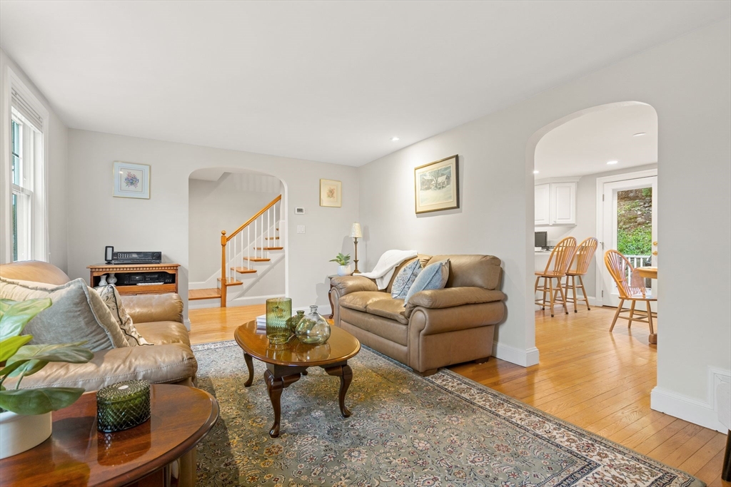 5 Brewster Road Arlington, MA 02478 - Photo 5 of 39 a living room with furniture and wooden floor