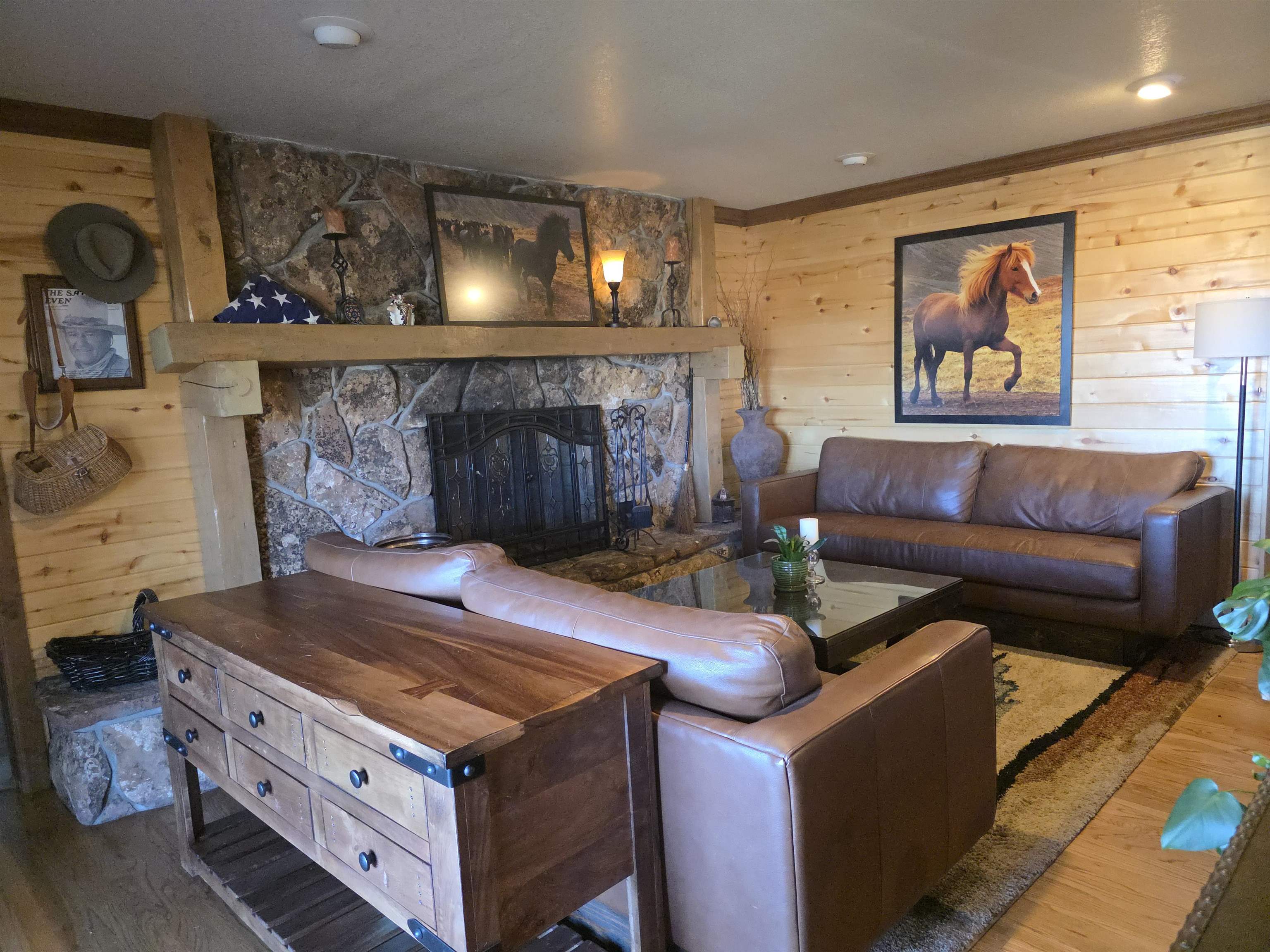 239 West Fallen Rock Road Grand Junction, CO 81507 - Photo 12 of 41 a living room with furniture and a fireplace