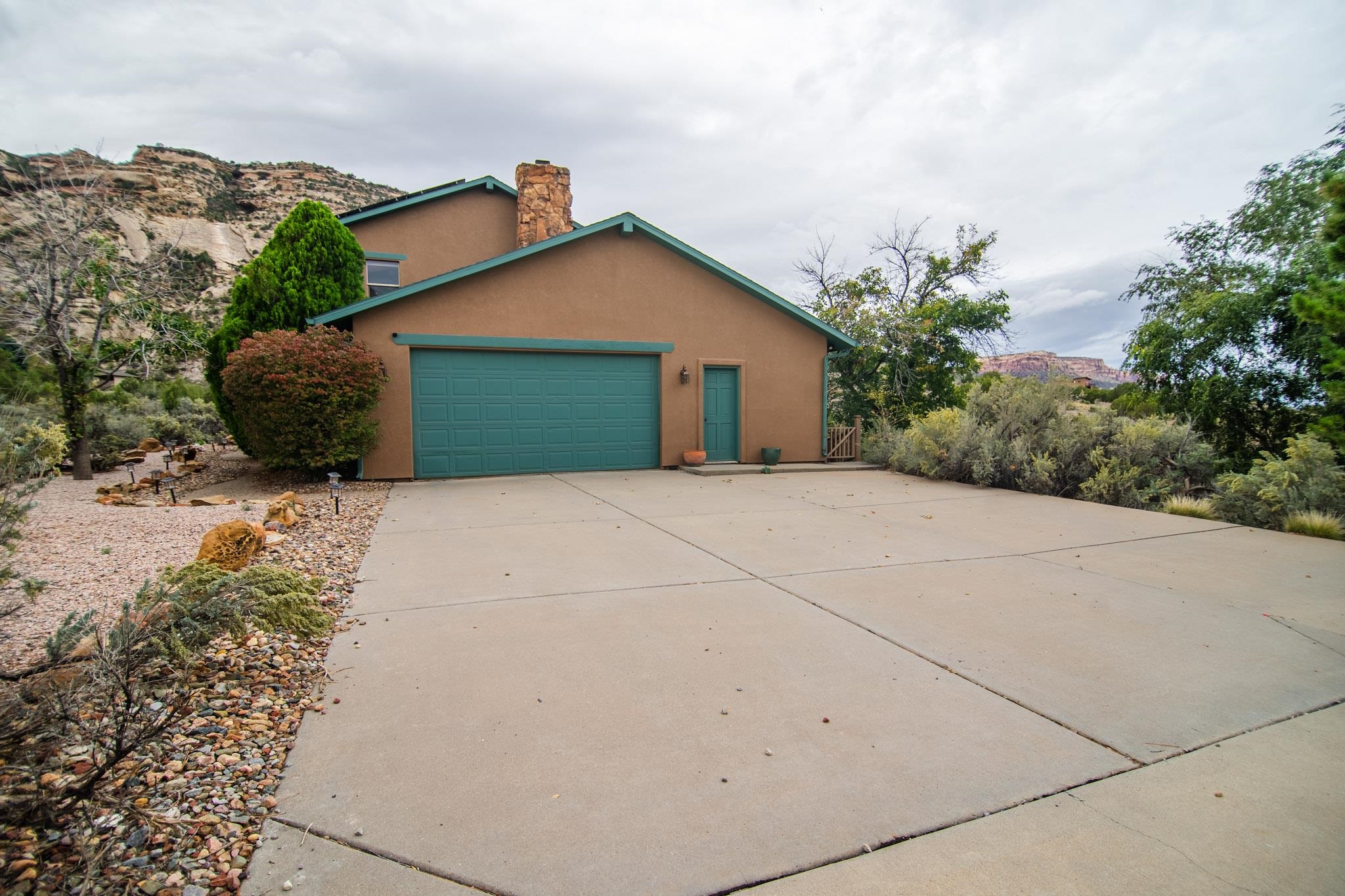 239 West Fallen Rock Road Grand Junction, CO 81507 - Photo 5 of 41 a view of backyard of house