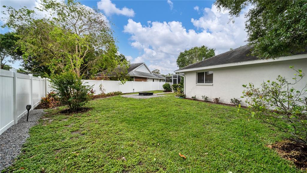 5219 Inverness Drive Sarasota, FL 34243 - Photo 3 of 32 a house view with a garden space