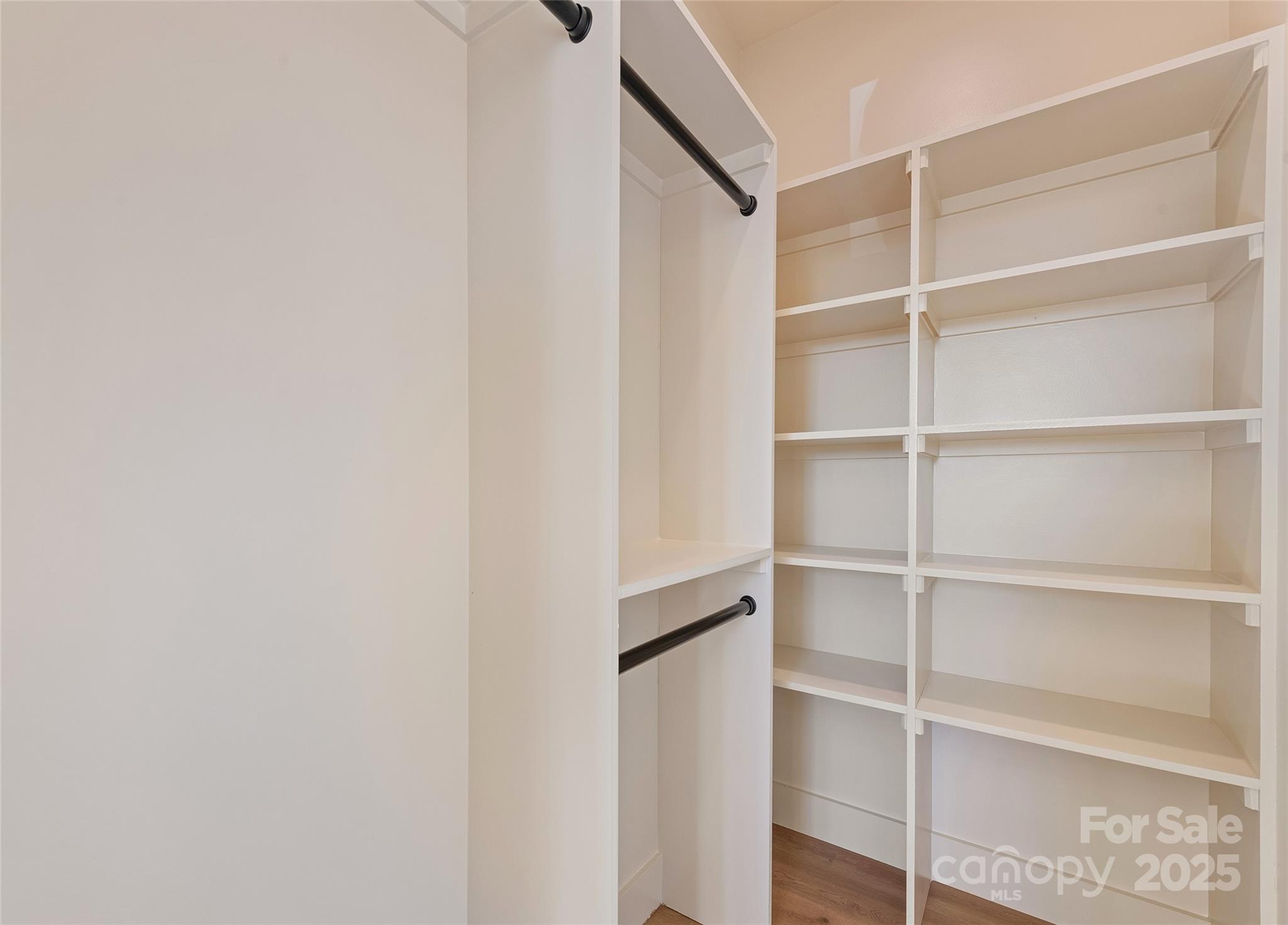 40 Firefly Ridge Trail Alexander, NC 28701 - Photo 18 of 33 a view of an empty walk in closet