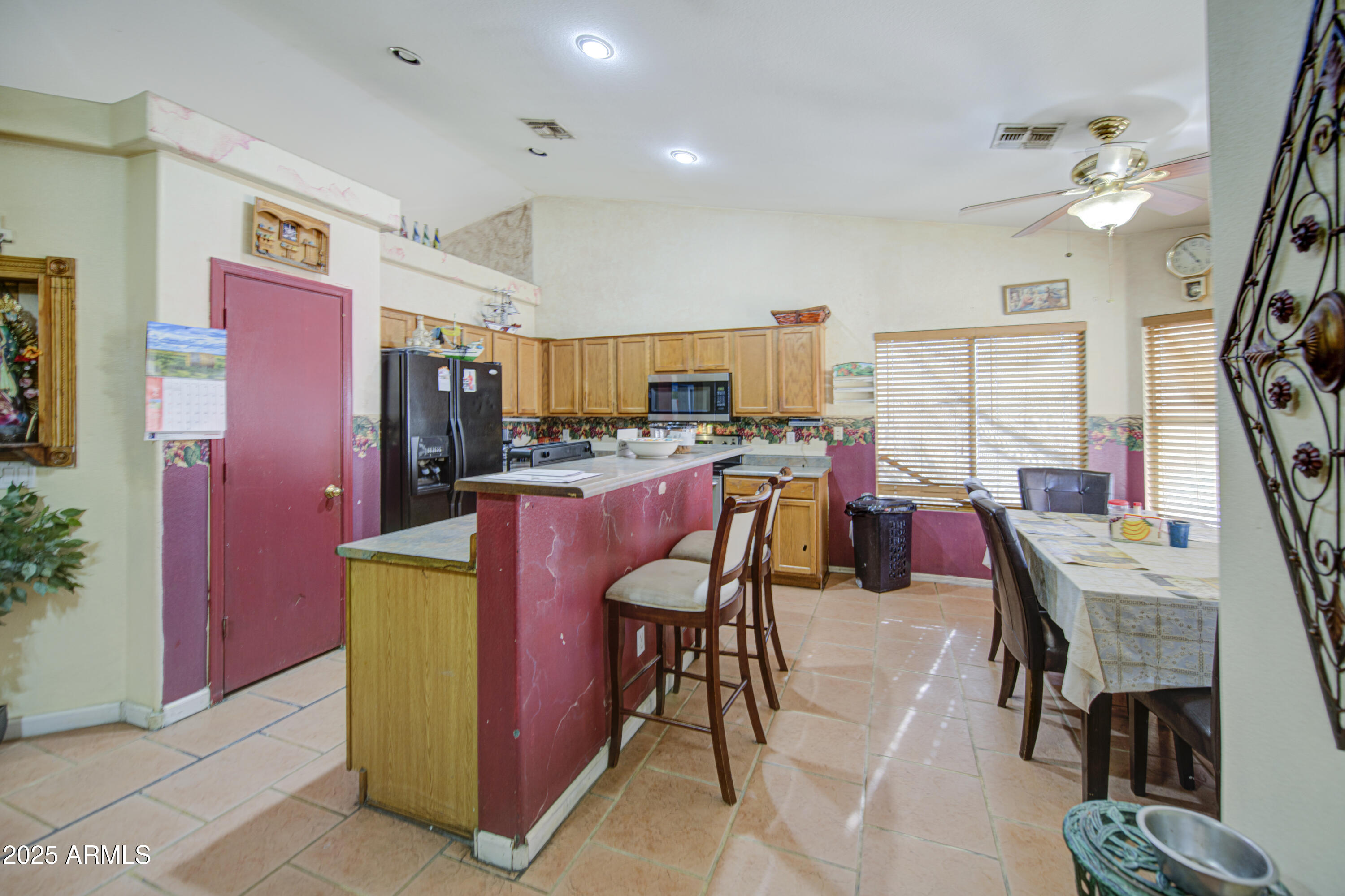 8530 West Berkeley Road Phoenix, AZ 85037 - Photo 14 of 48 a view of a dining room with furniture