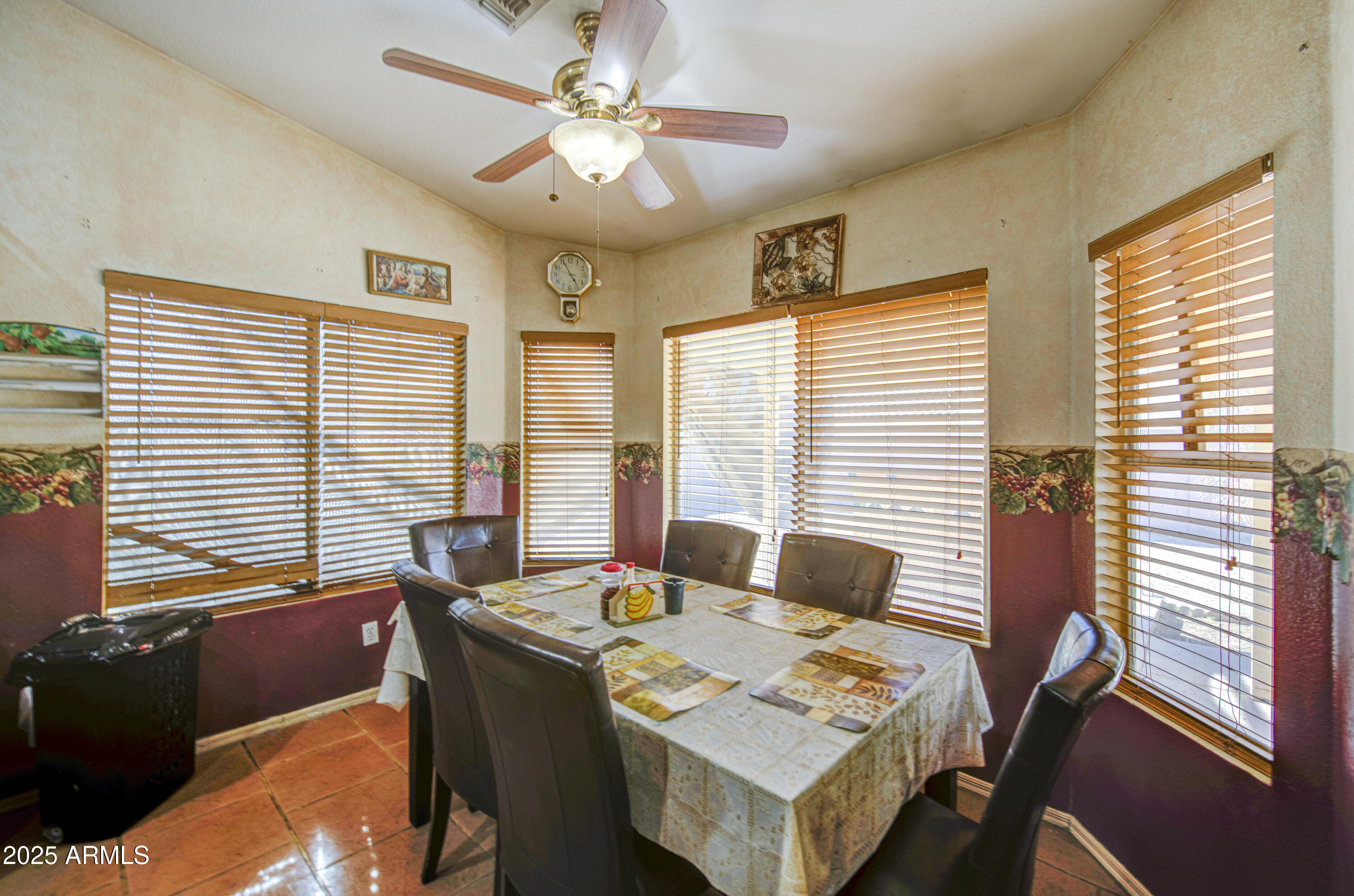 8530 West Berkeley Road Phoenix, AZ 85037 - Photo 16 of 48 a view of a dining room with furniture window and outside view