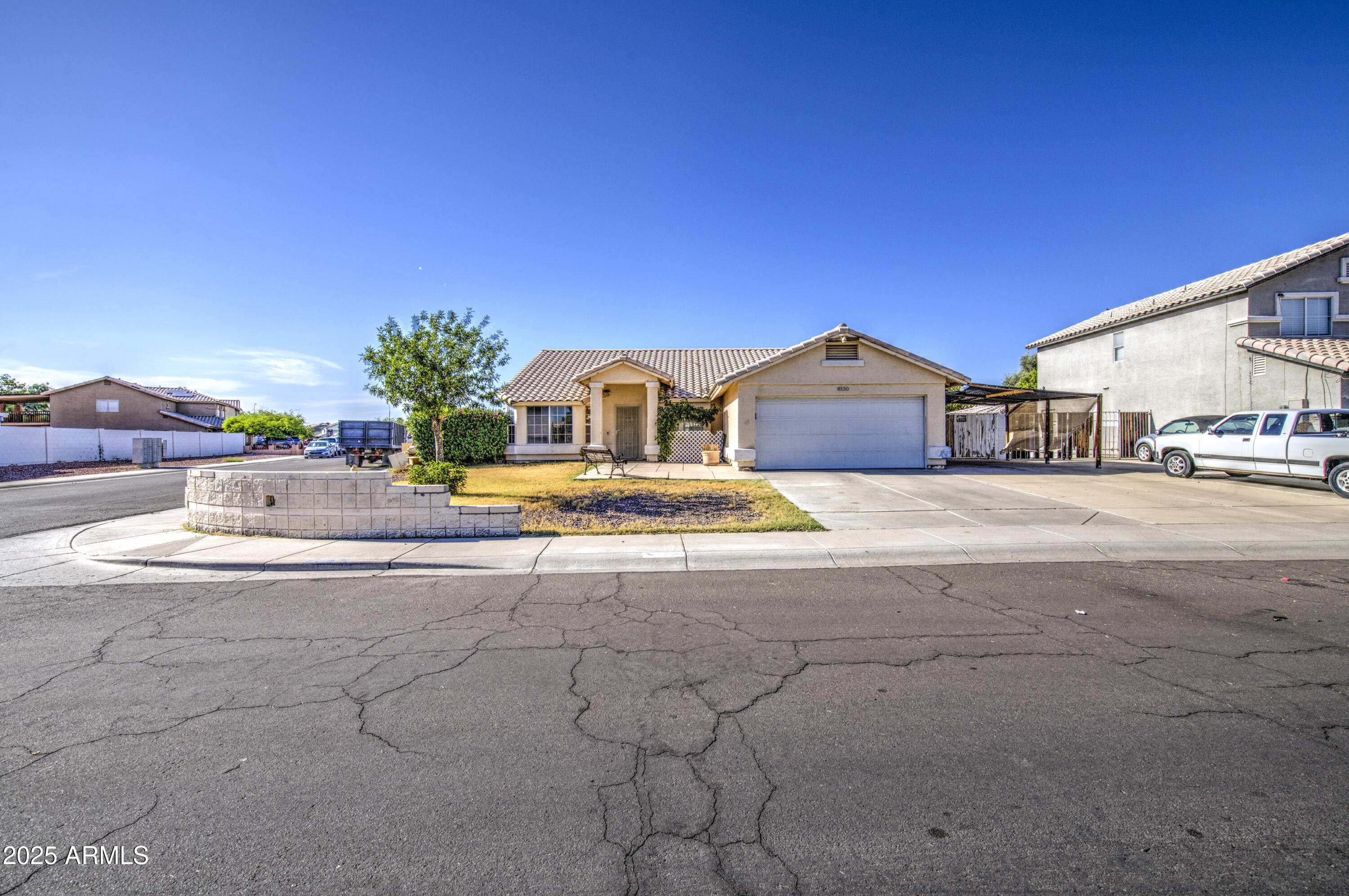 8530 West Berkeley Road Phoenix, AZ 85037 - Photo 3 of 48 a view of houses with cars