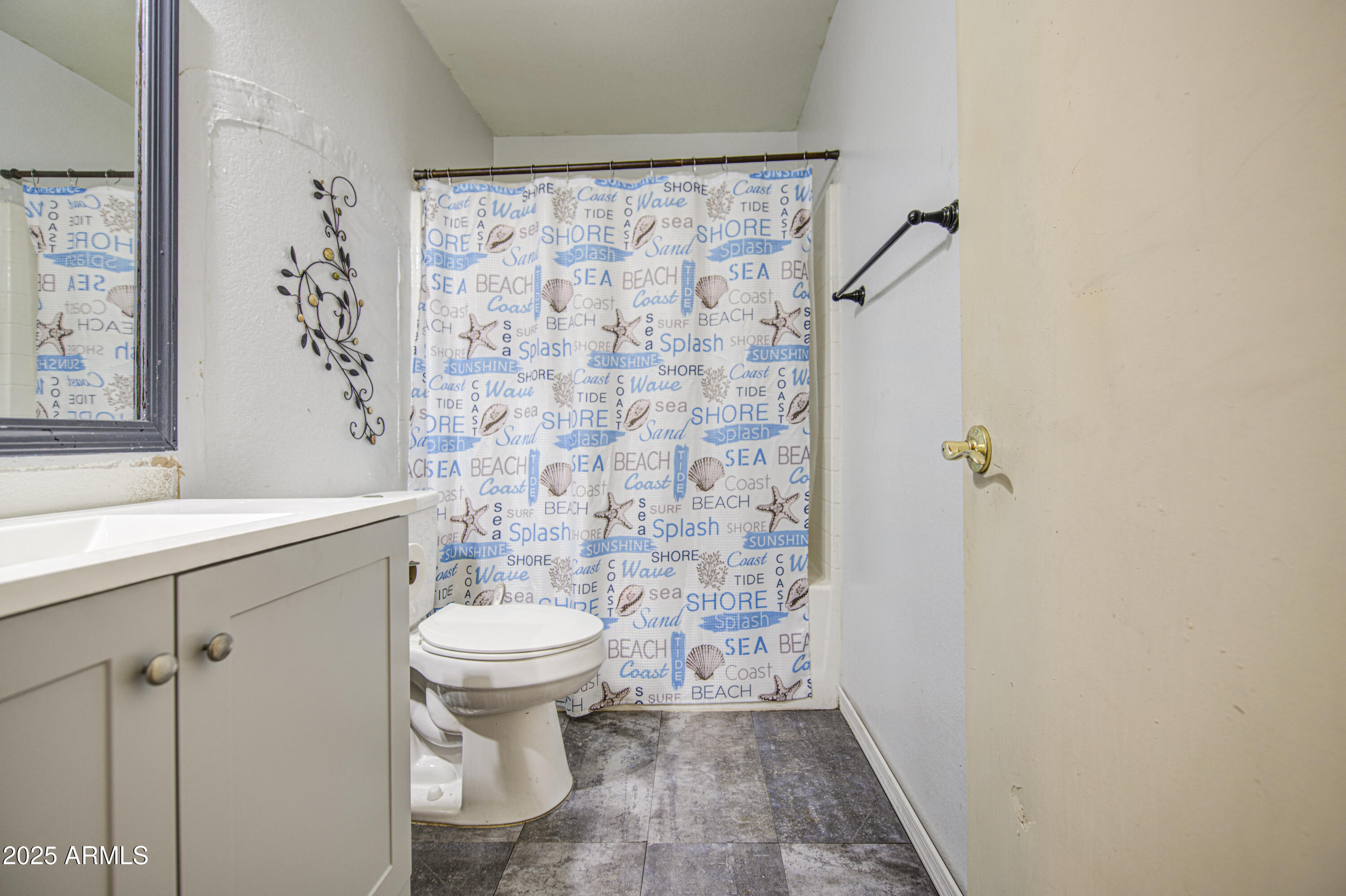 8530 West Berkeley Road Phoenix, AZ 85037 - Photo 37 of 48 a bathroom with a sink toilet and shower