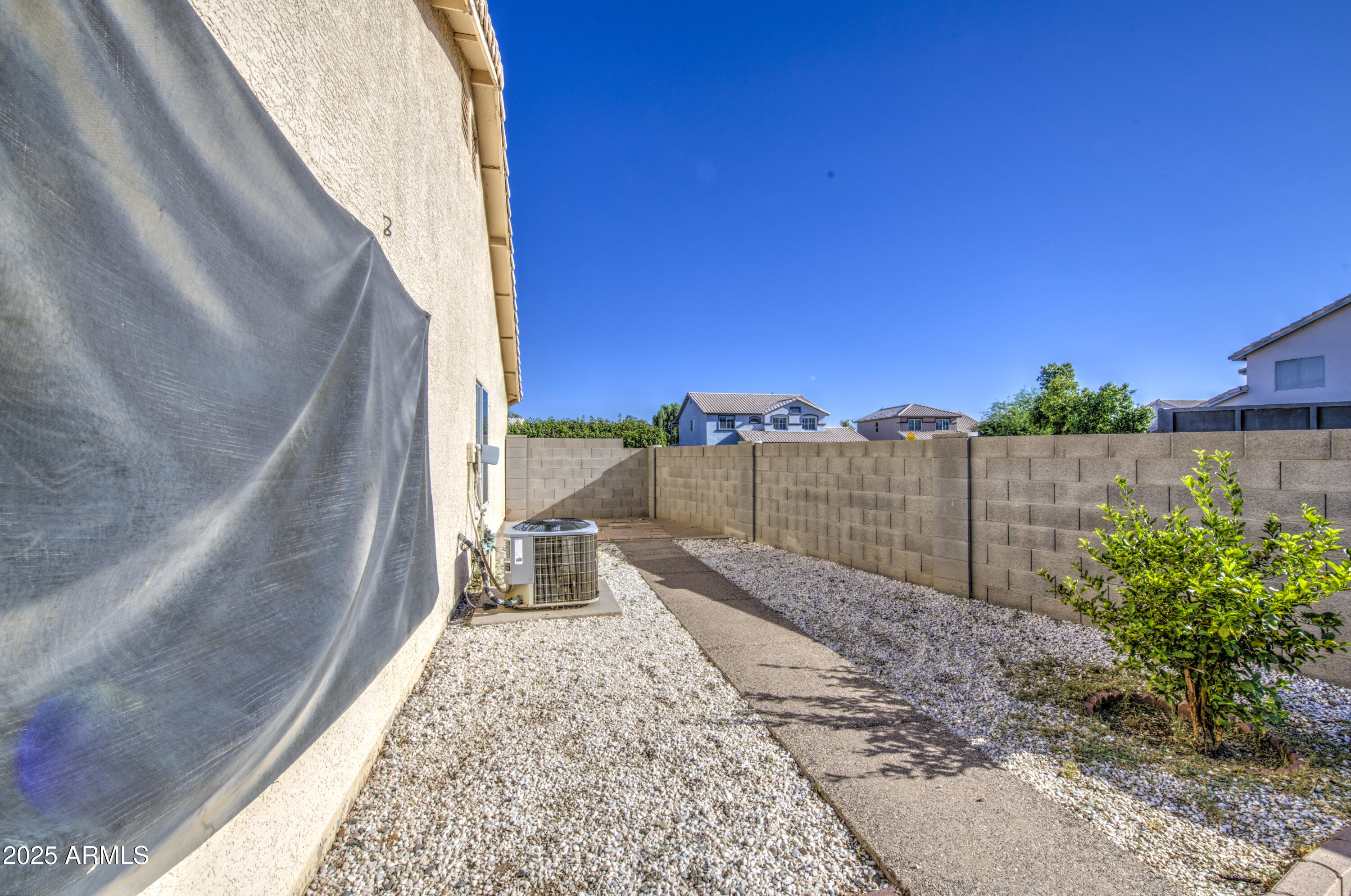 8530 West Berkeley Road Phoenix, AZ 85037 - Photo 42 of 48 a view of a pathway with a backyard