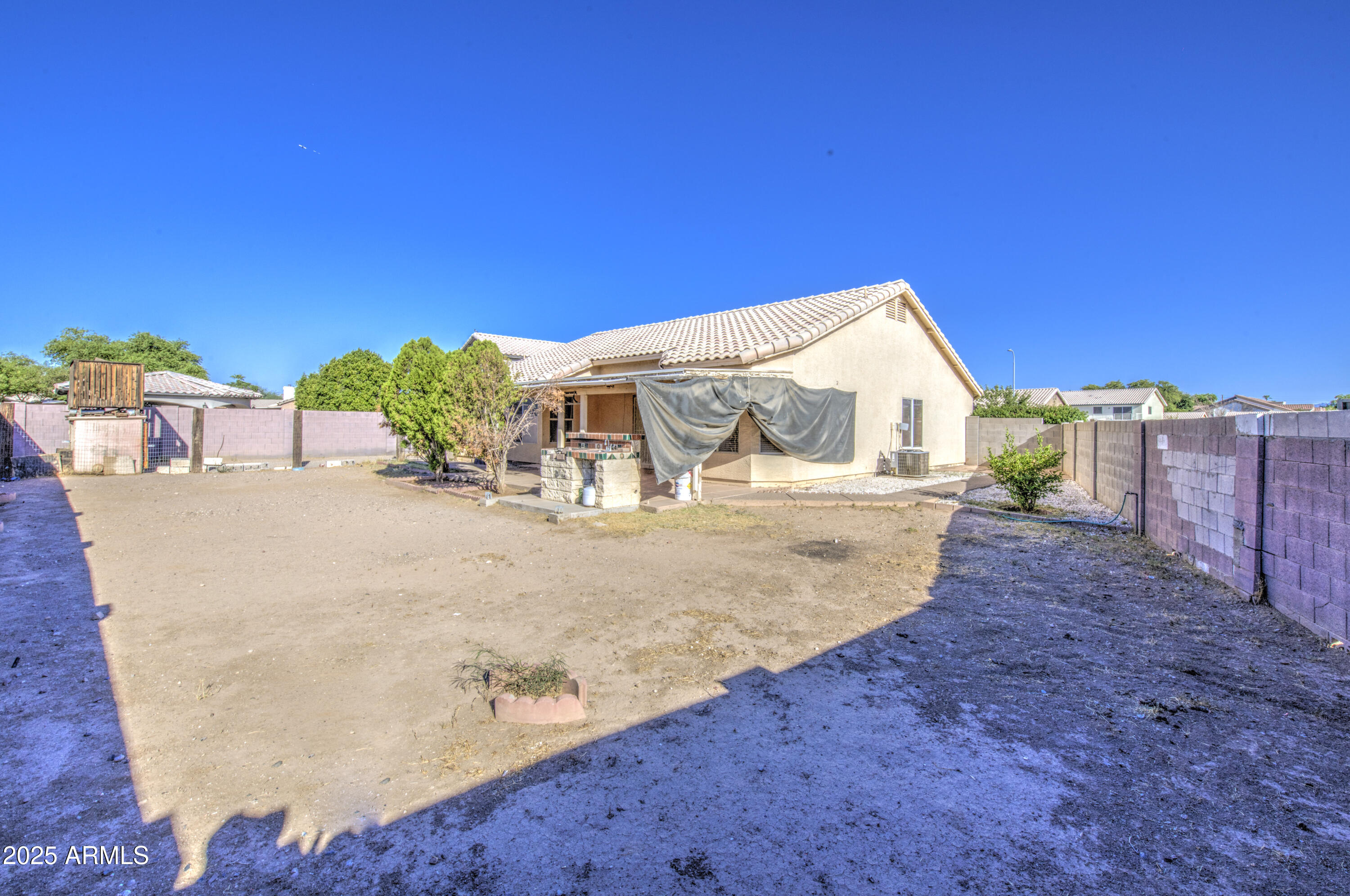 8530 West Berkeley Road Phoenix, AZ 85037 - Photo 44 of 48 a view of a house with a outdoor space
