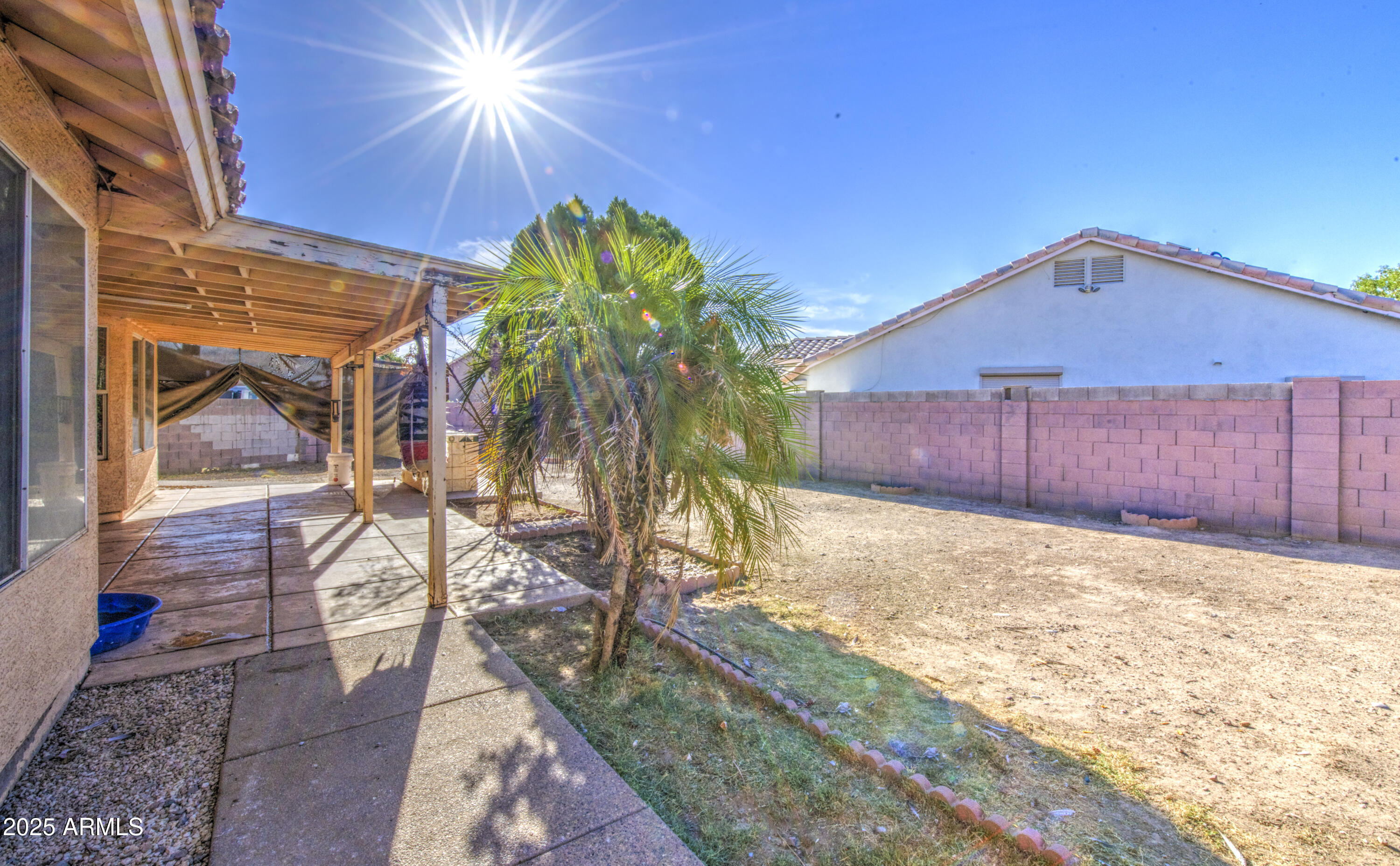 8530 West Berkeley Road Phoenix, AZ 85037 - Photo 47 of 48 a house view with a backyard space