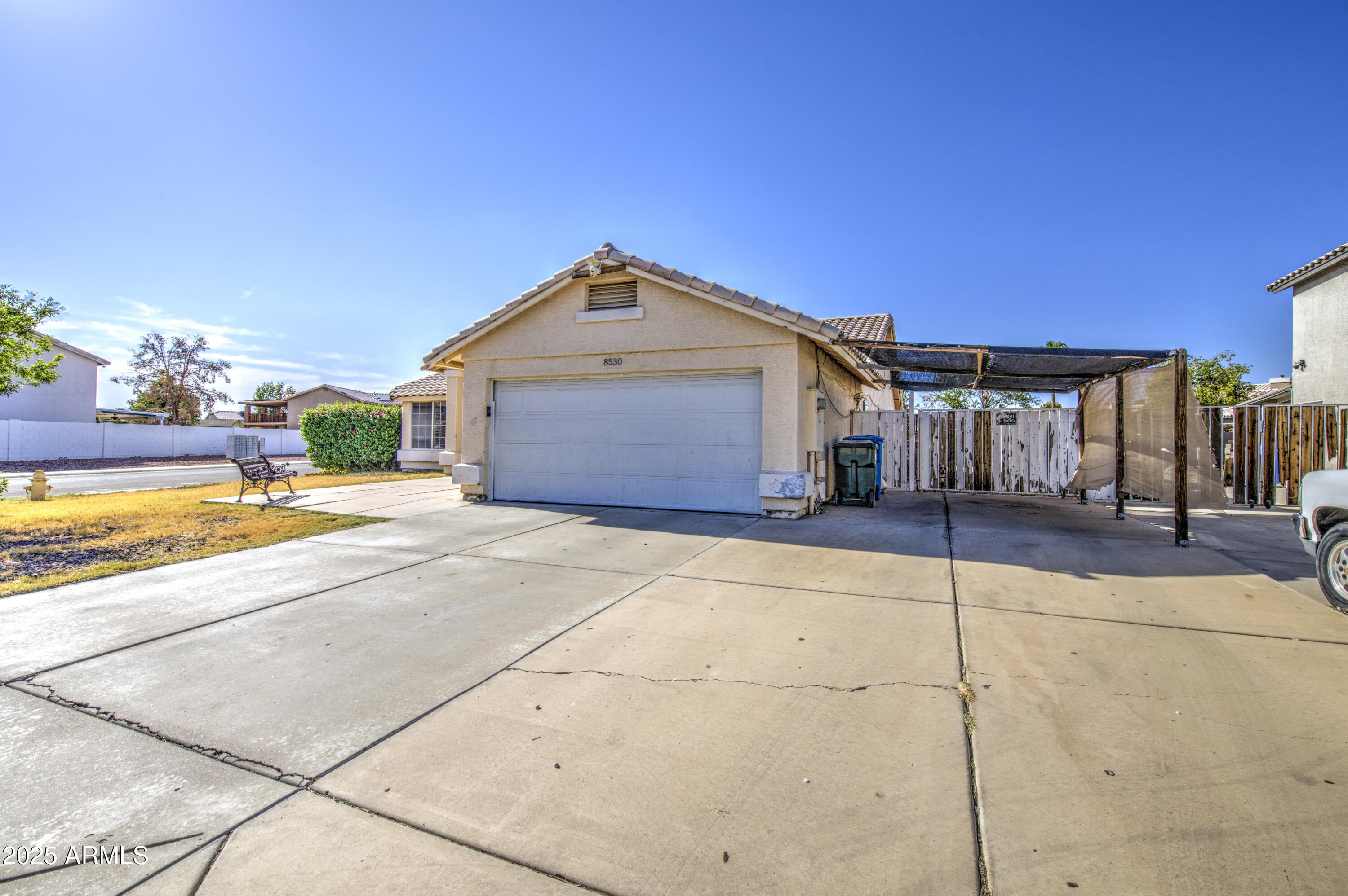 8530 West Berkeley Road Phoenix, AZ 85037 - Photo 5 of 48 a house view with a outdoor space