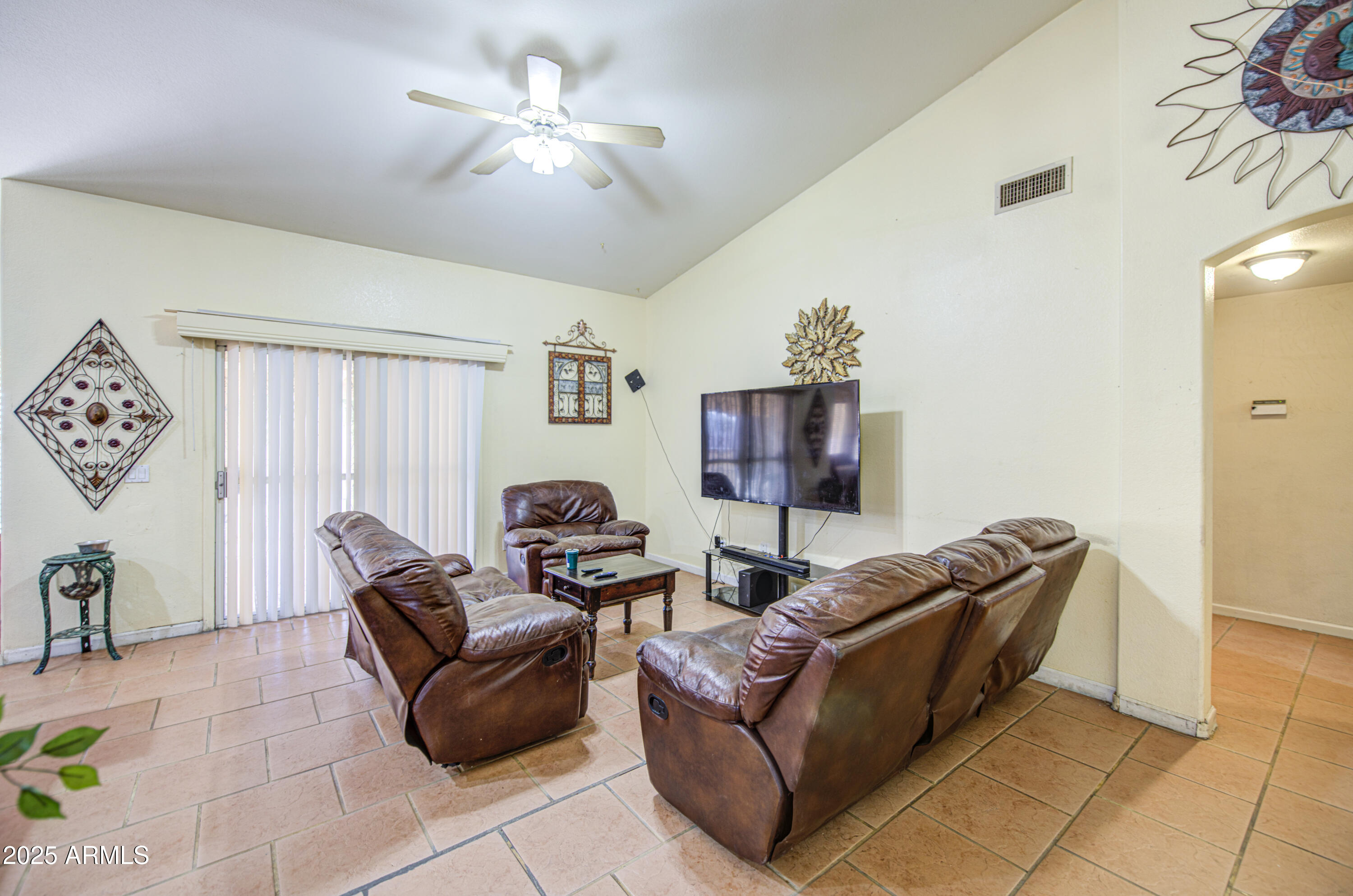 8530 West Berkeley Road Phoenix, AZ 85037 - Photo 10 of 48 a living room with furniture and a window
