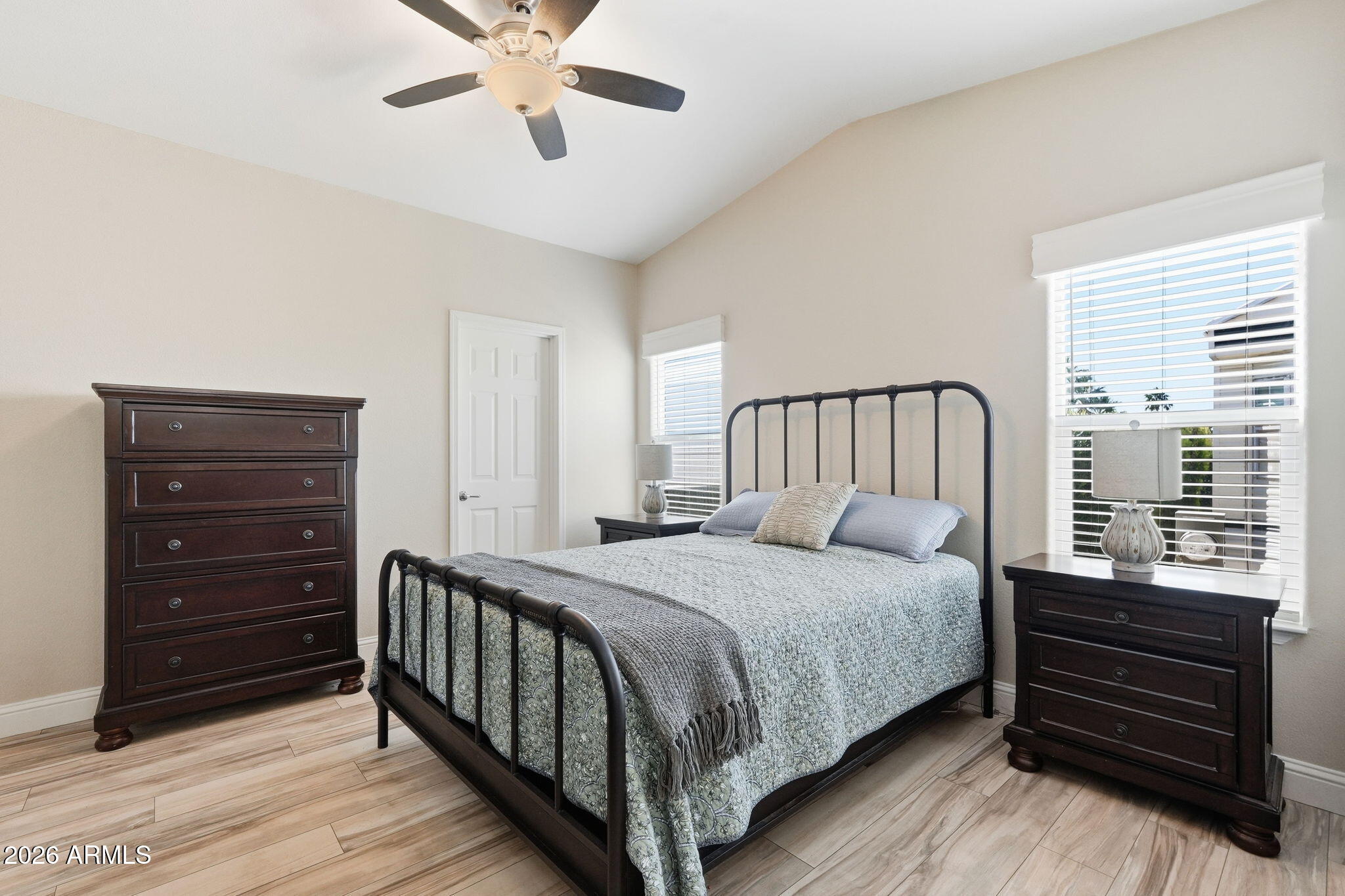 8865 East Baseline Road, Unit 1417 Mesa, AZ 85209 - Photo 5 of 47 a bedroom with a bed and a window