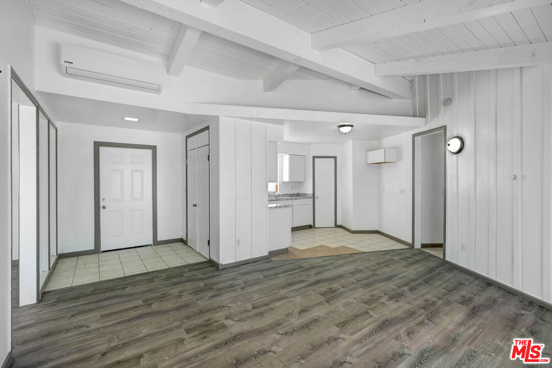 37170 Rabbit Springs Road Lucerne Valley, CA 92356 - Photo 4 of 10 a view of empty room with wooden floor