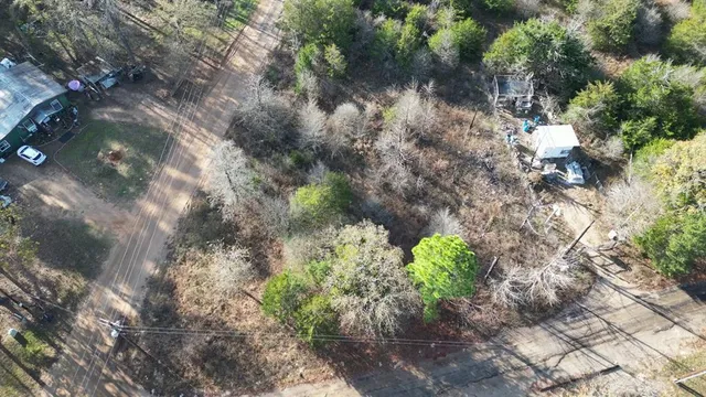 a backyard of a house with a yard with outdoor seating