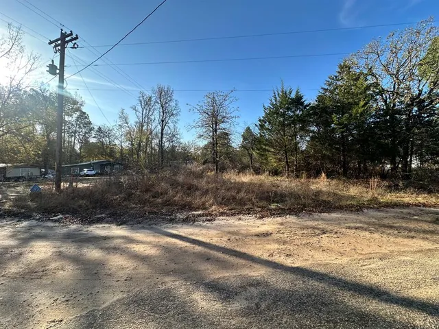 a view of road with trees