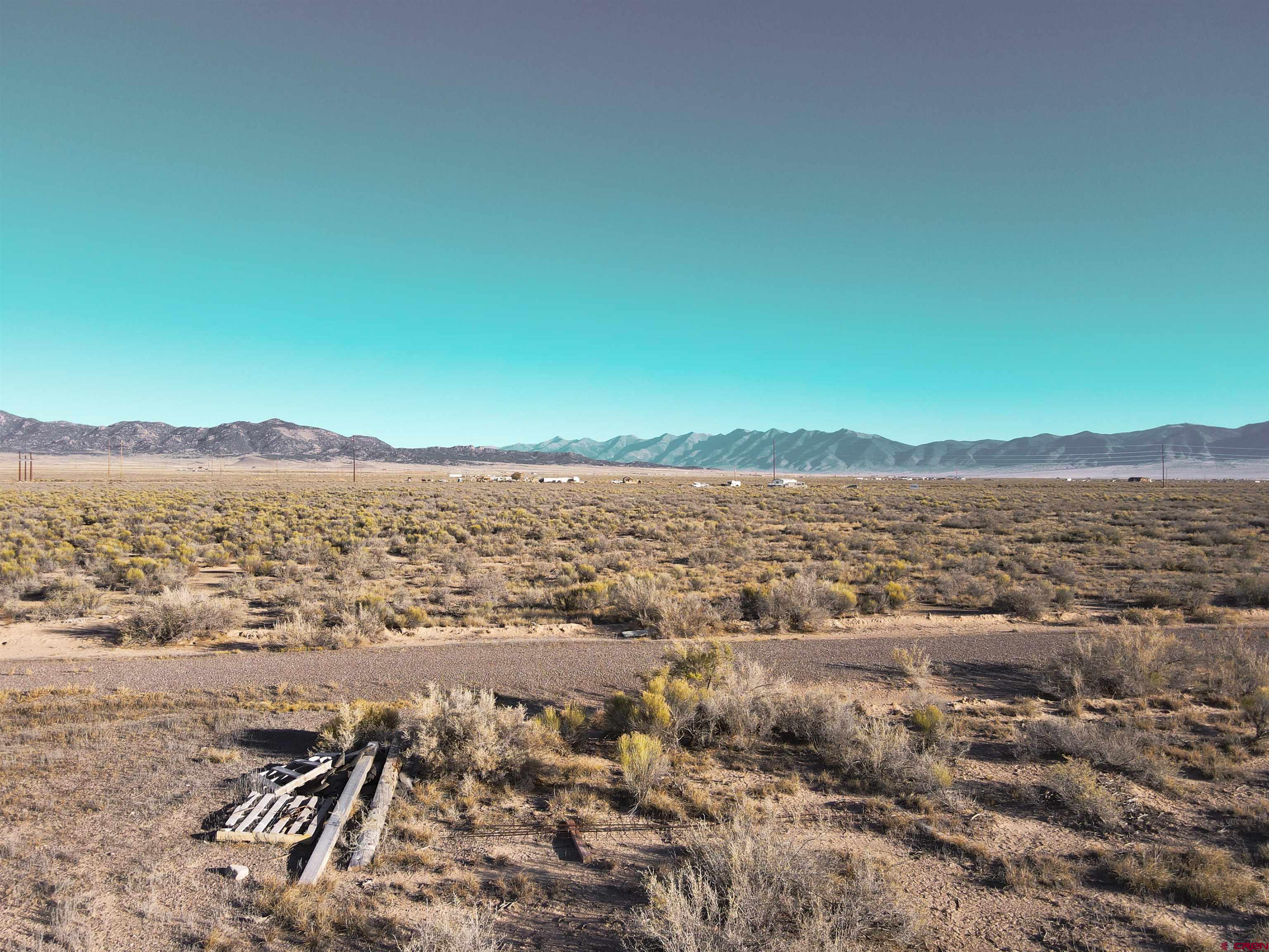 55750 Aa Road Moffat, CO 81143 - Photo 13 of 29 an aerial view of residential building and lake