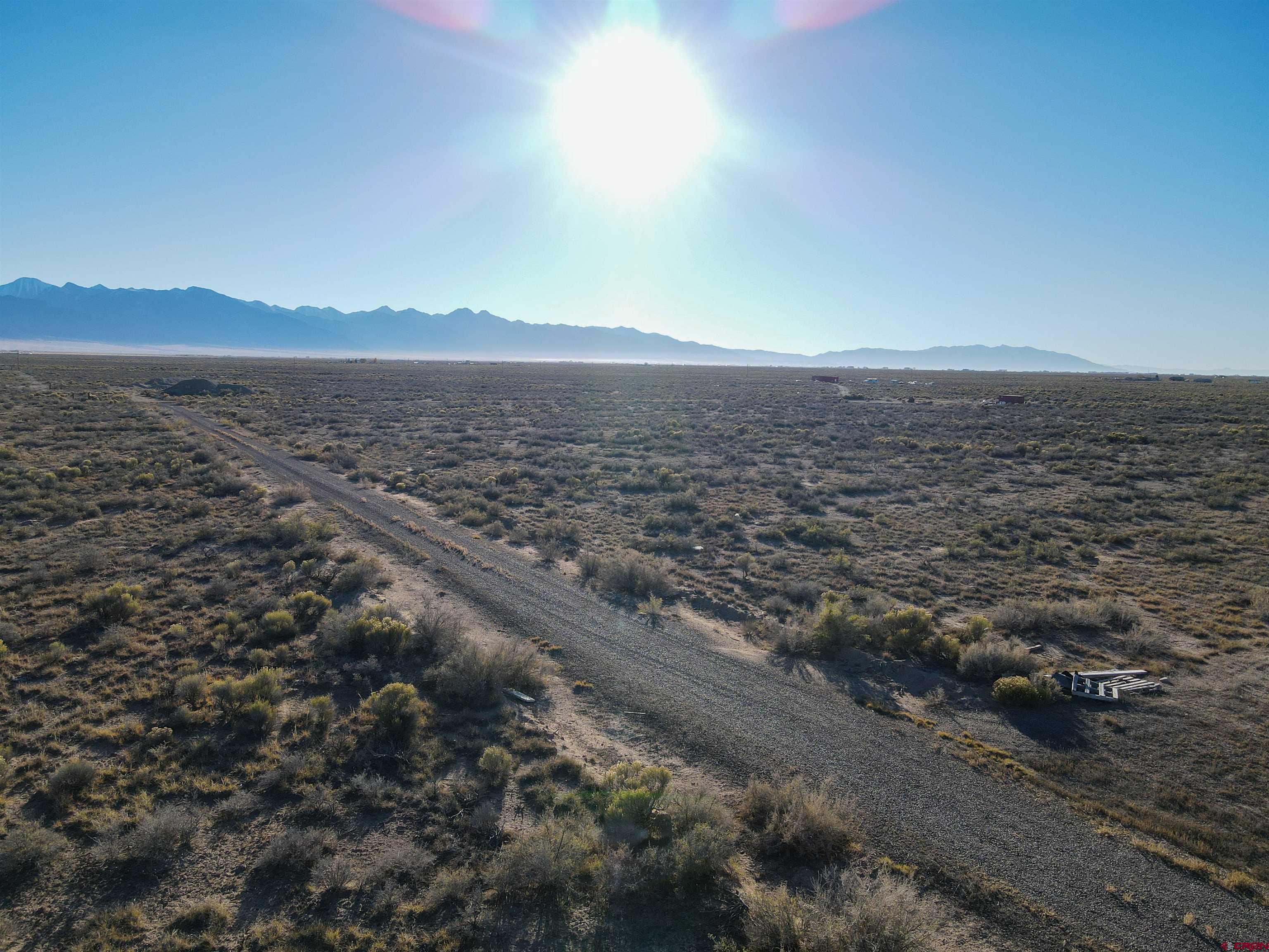 55750 Aa Road Moffat, CO 81143 - Photo 3 of 29 an aerial view of residential building and ocean