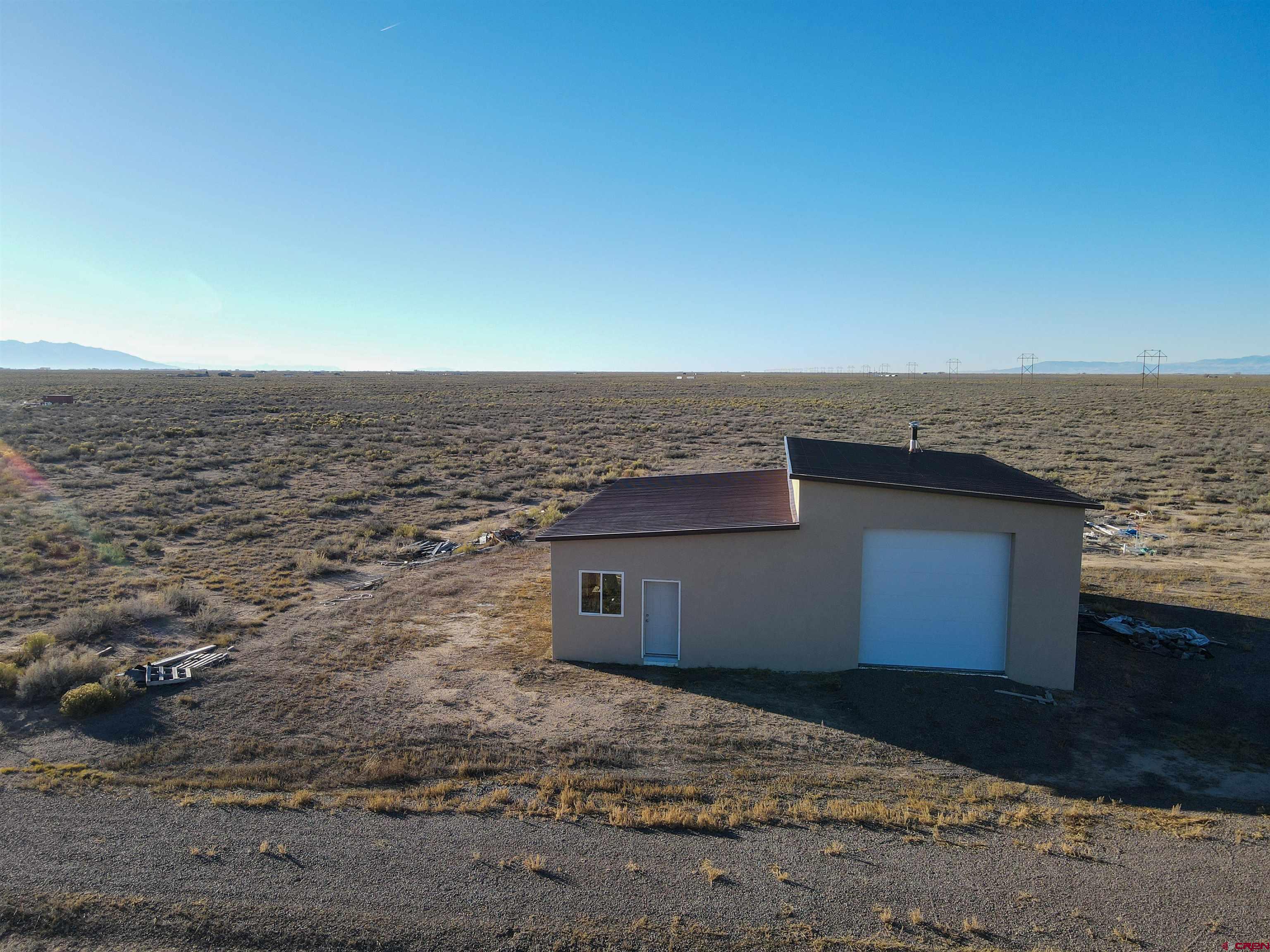 55750 Aa Road Moffat, CO 81143 - Photo 5 of 29 a view of a terrace with a outdoor space