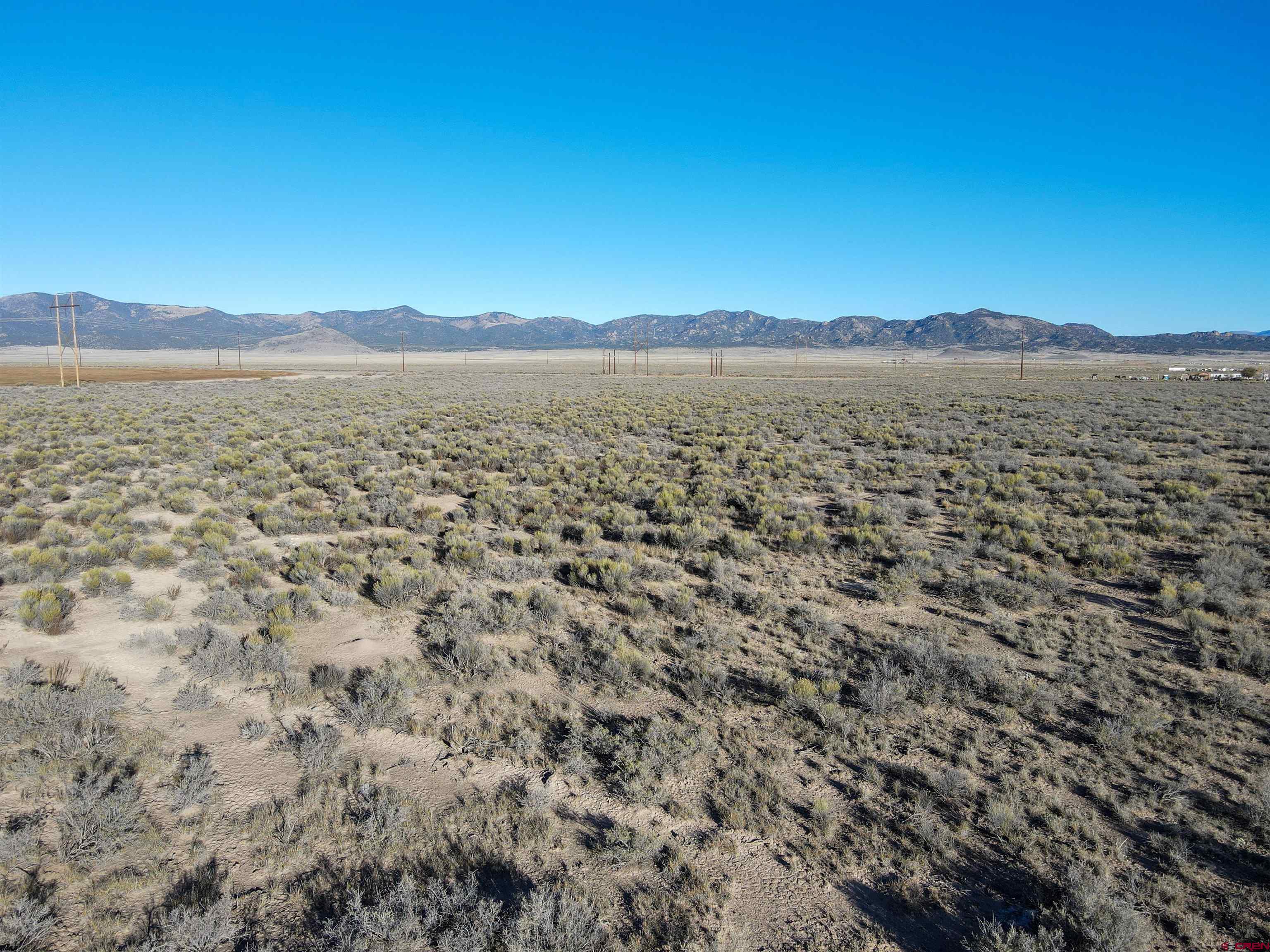 55750 Aa Road Moffat, CO 81143 - Photo 6 of 29 a view of lake and mountain in the background