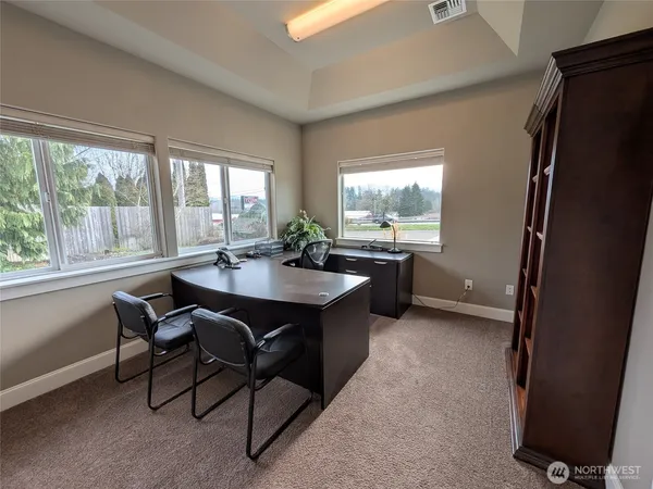 a view of a kitchen area with furniture and window