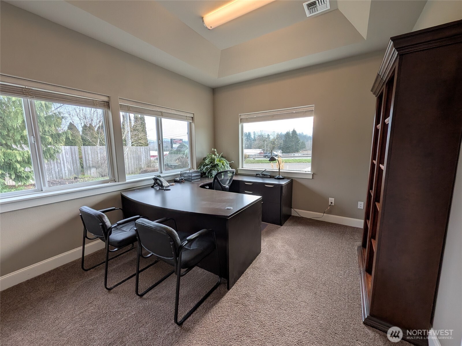 259003 Highway 101, Unit B Sequim, WA 98382 - Photo 11 of 21 a view of a kitchen area with furniture and window