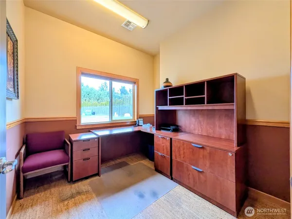 a room with furniture and window