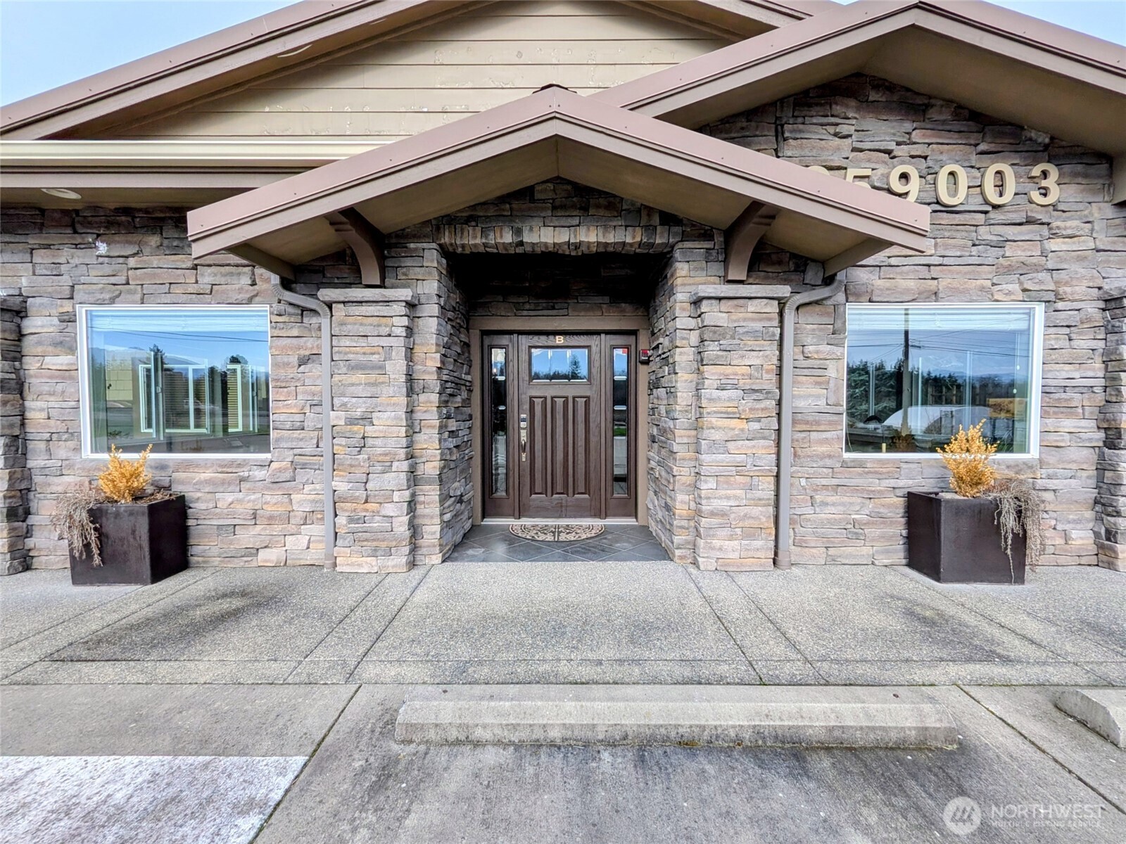 259003 Highway 101, Unit B Sequim, WA 98382 - Photo 3 of 21 a view of a entryway door of the building