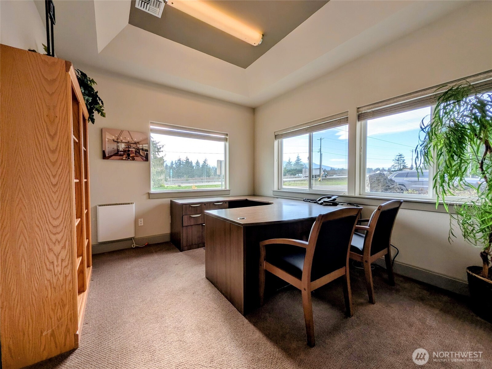 259003 Highway 101, Unit B Sequim, WA 98382 - Photo 10 of 21 a view of a workspace with furniture and a window
